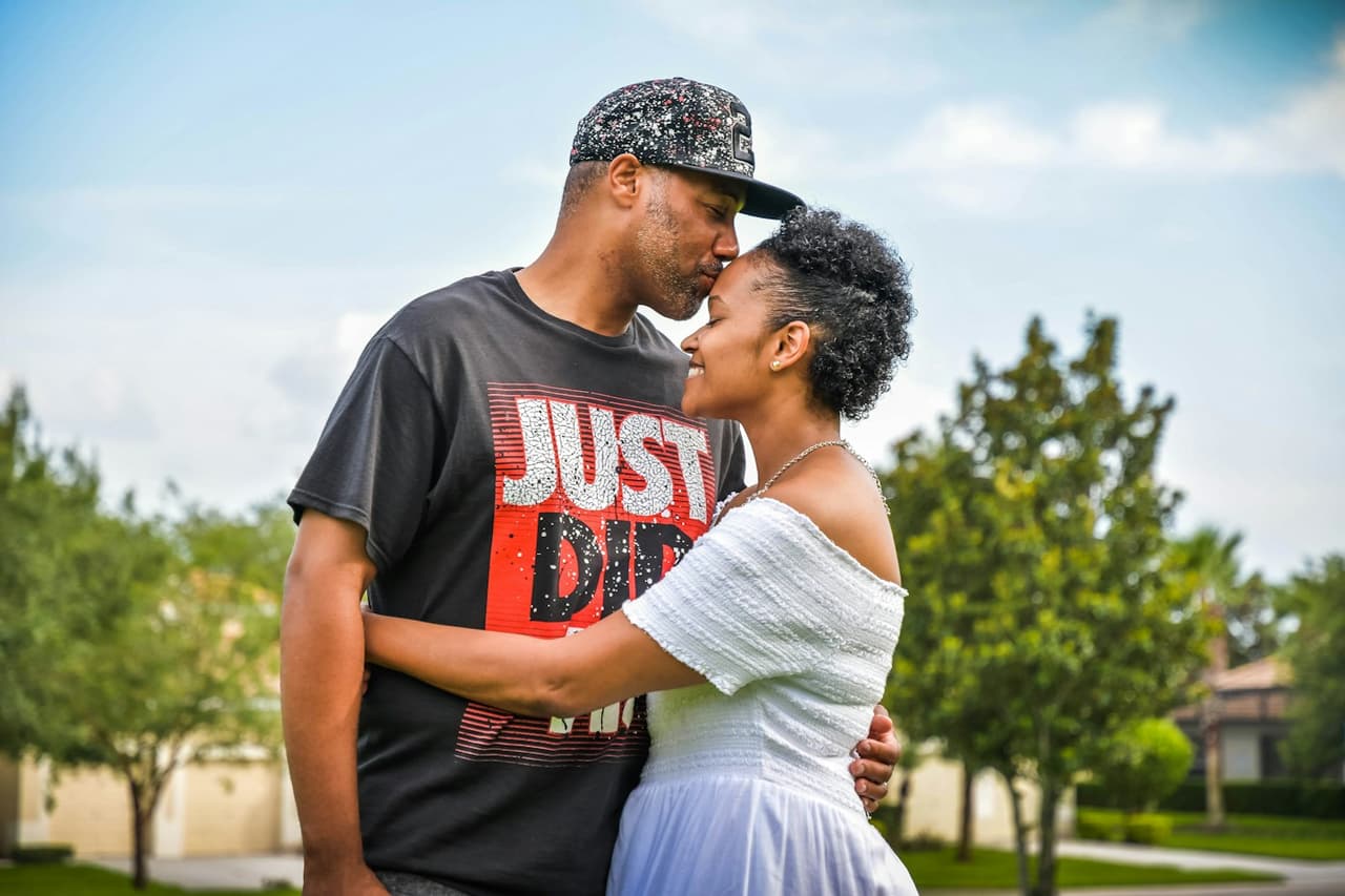 A Kenyan couple sharing a quiet moment outdoors